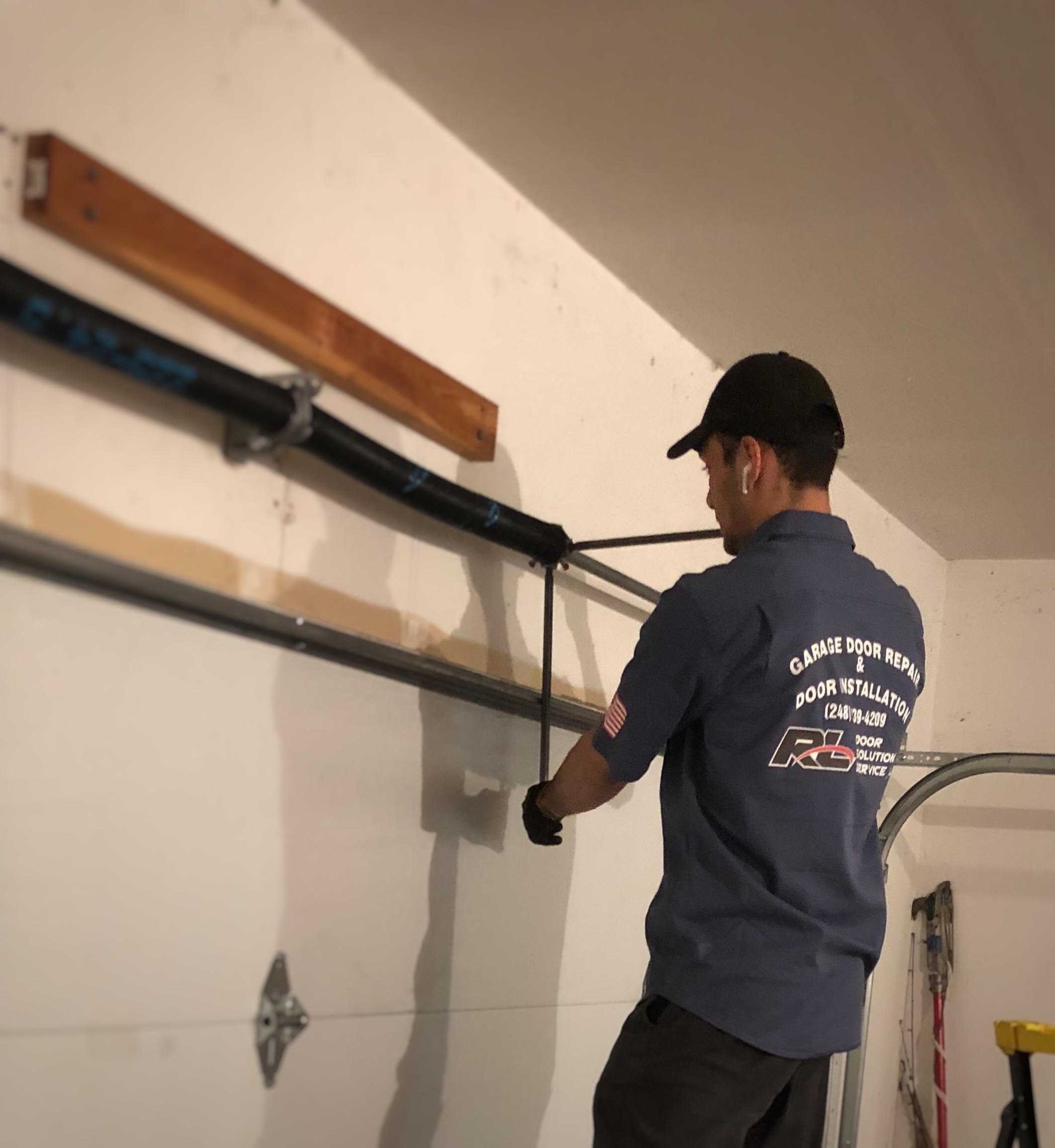 Broken garage door spring replacement